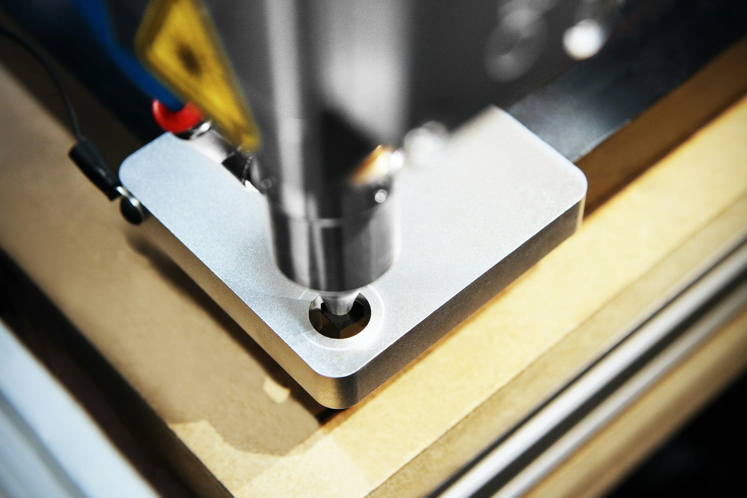 CNC cutting machine cutting a metal block
