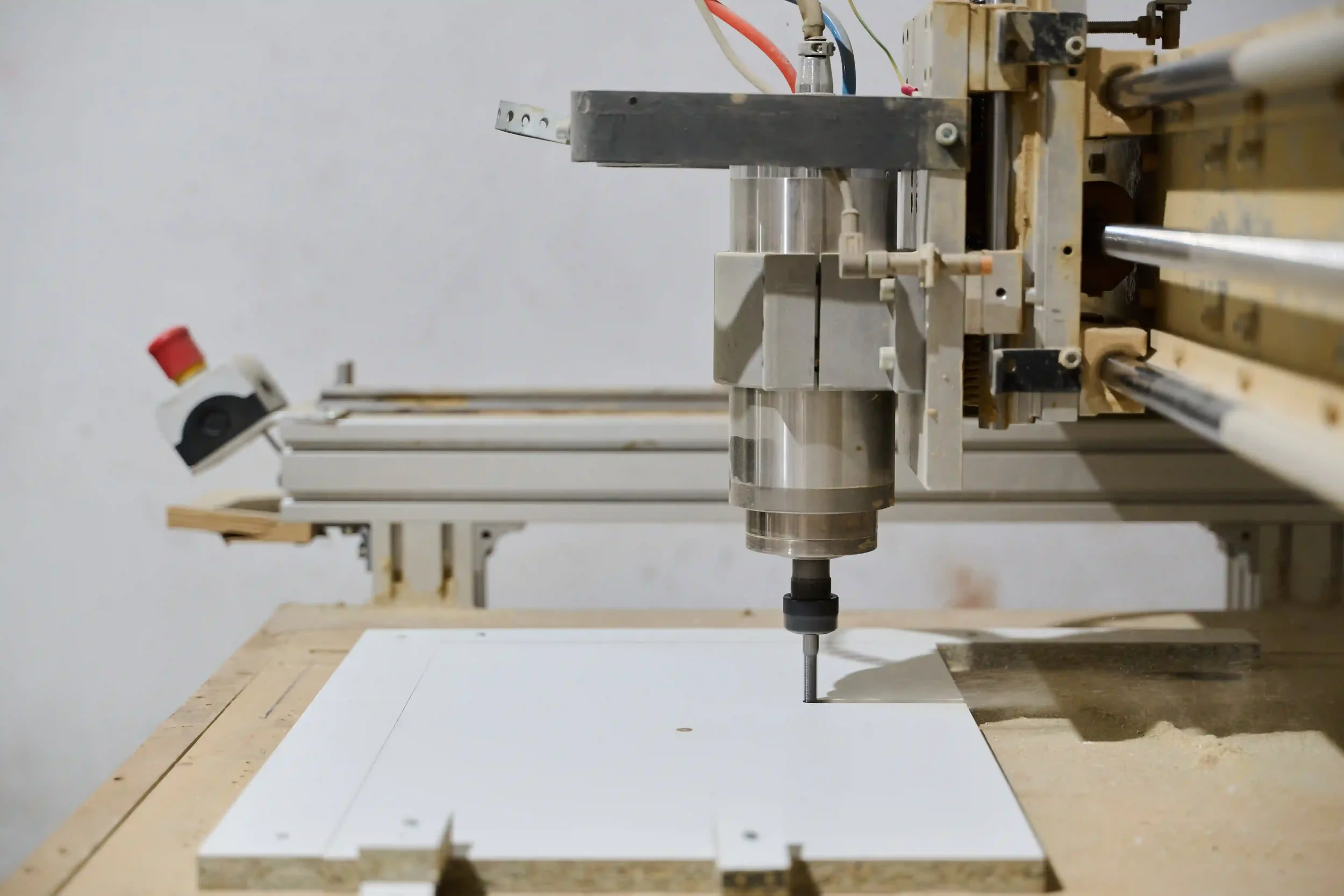 Close-Up of CNC Machine Precisely Cutting and Processing Wooden Boards