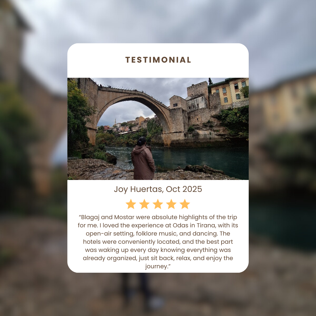 Testimonial card with a photo of a person standing by the river with an arched stone bridge and old buildings in the background. The card contains five stars, the name Joy Huertas, date October 2025, and a positive travel review.
