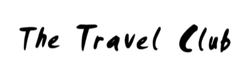 Text reading 'The Travel Club' in a cursive font.