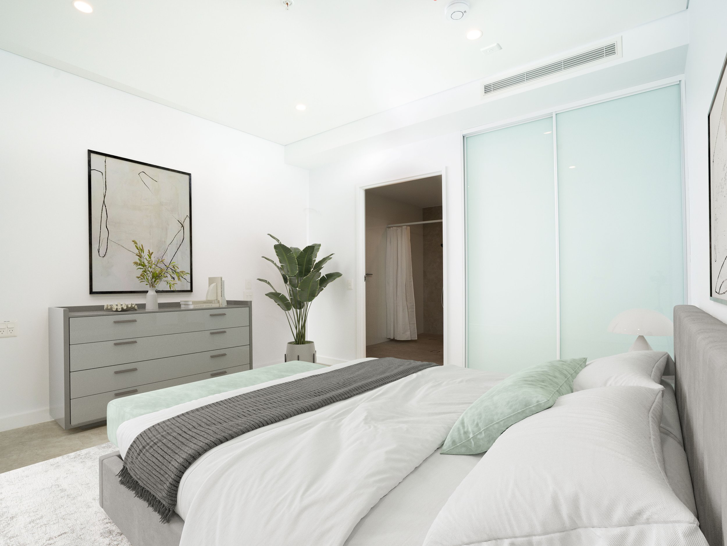 Bedroom with king sized bed and big closet with sliding doors