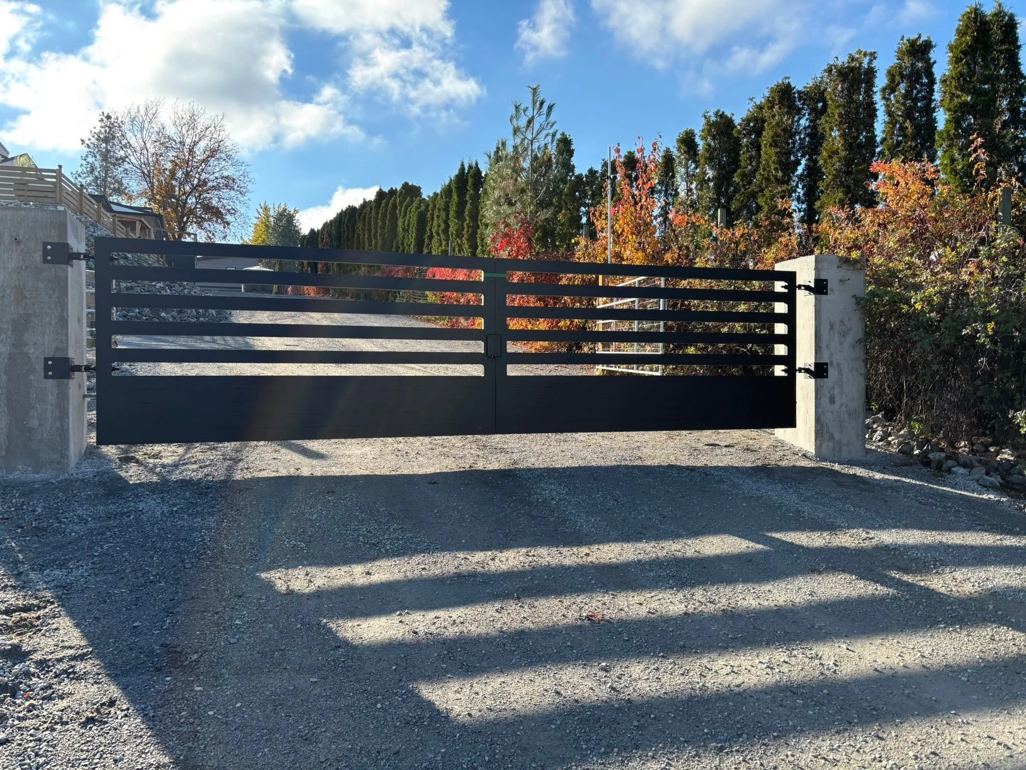 modern home driveway gate Kelowna BC