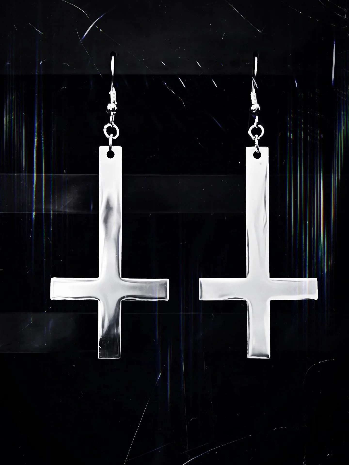 A hidden sigil forged in steel. Obsidian Inversion suspends the inverted cross beneath a sleek hoop &ndash; subtle, sharp &amp; unrelenting.

Dropping Thursday.

⸻

#NightboundCreations #DarkStyle #HandmadeAccessories #HeavyMetalStyle #GothicFashion 