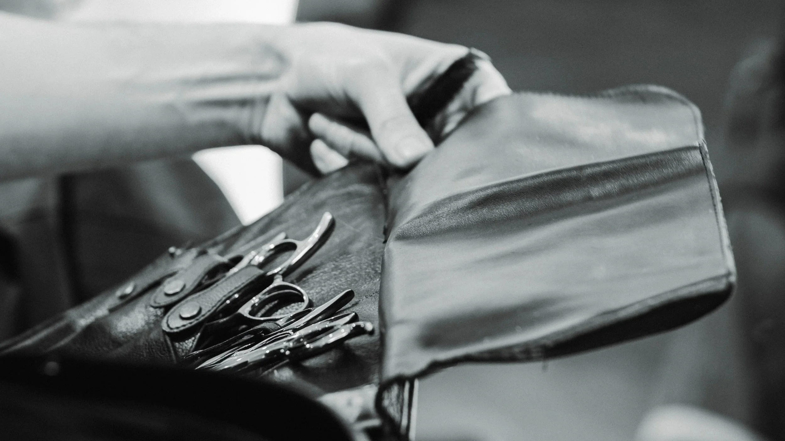 Professional hairdressing tools prepared for precision cutting.