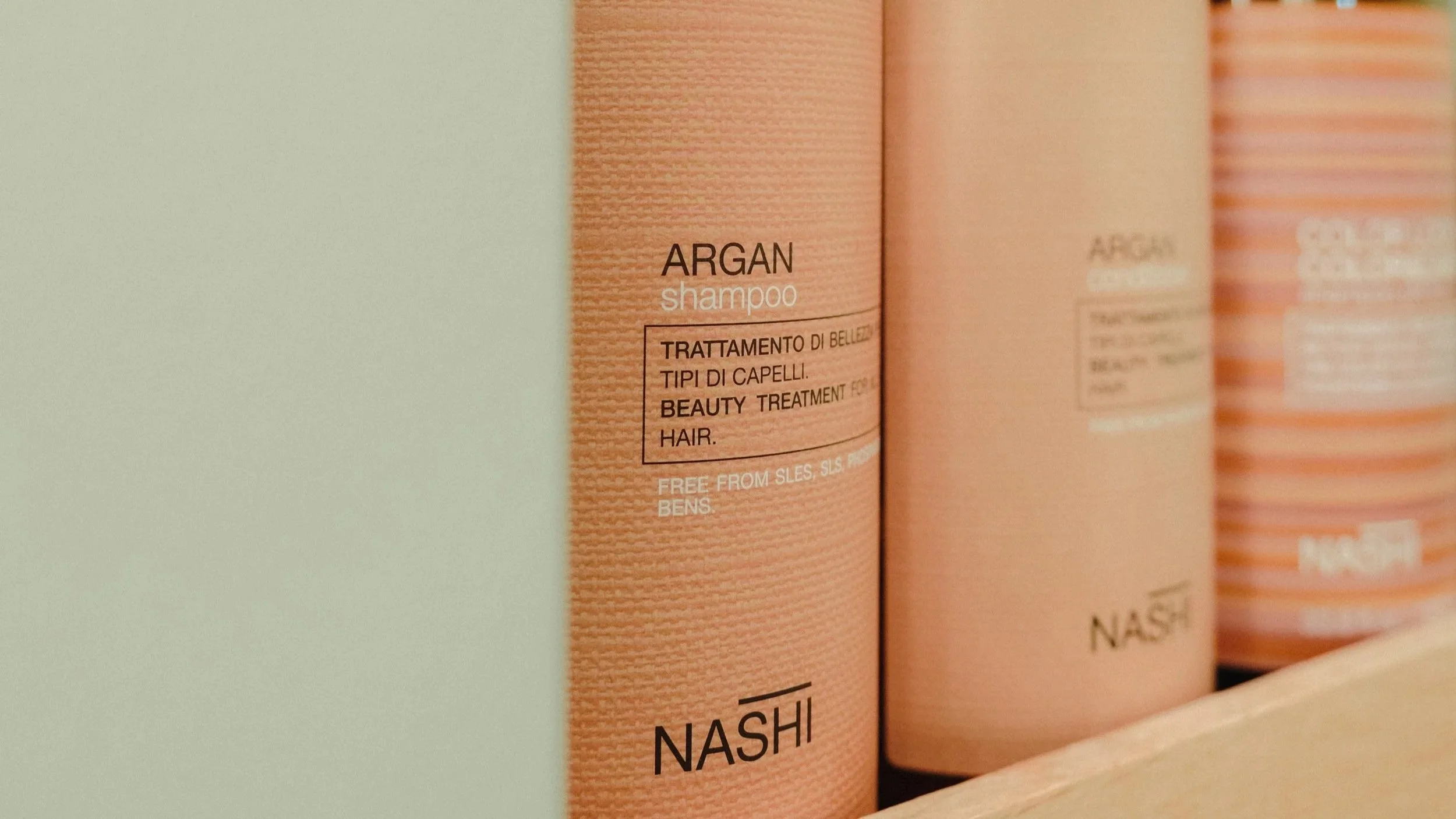 Professional Nashi hair care products used during salon appointments.