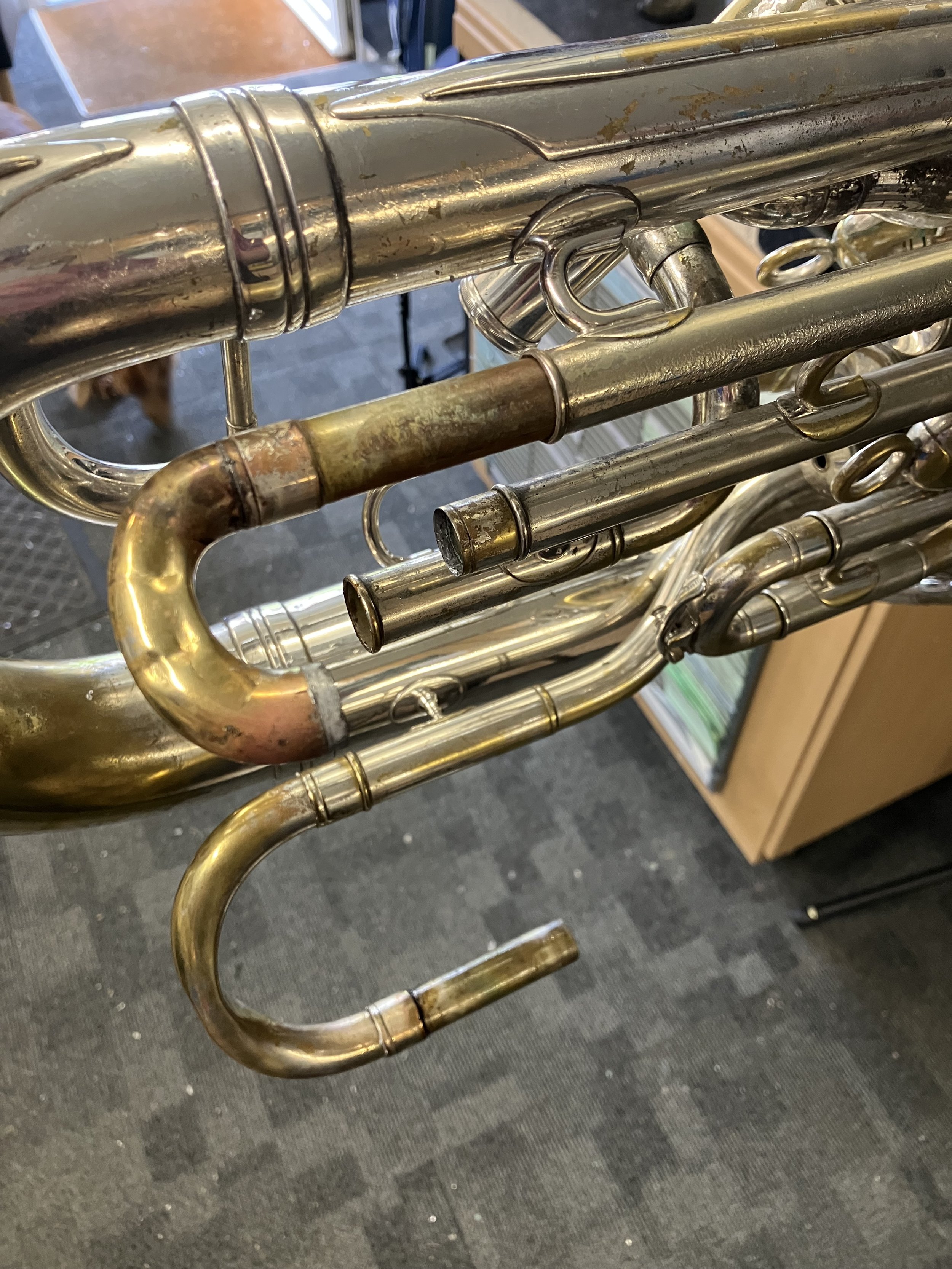 some slides needed pulling by unsoldering individual legs on the horn. This is a common technique on silver plated instruments