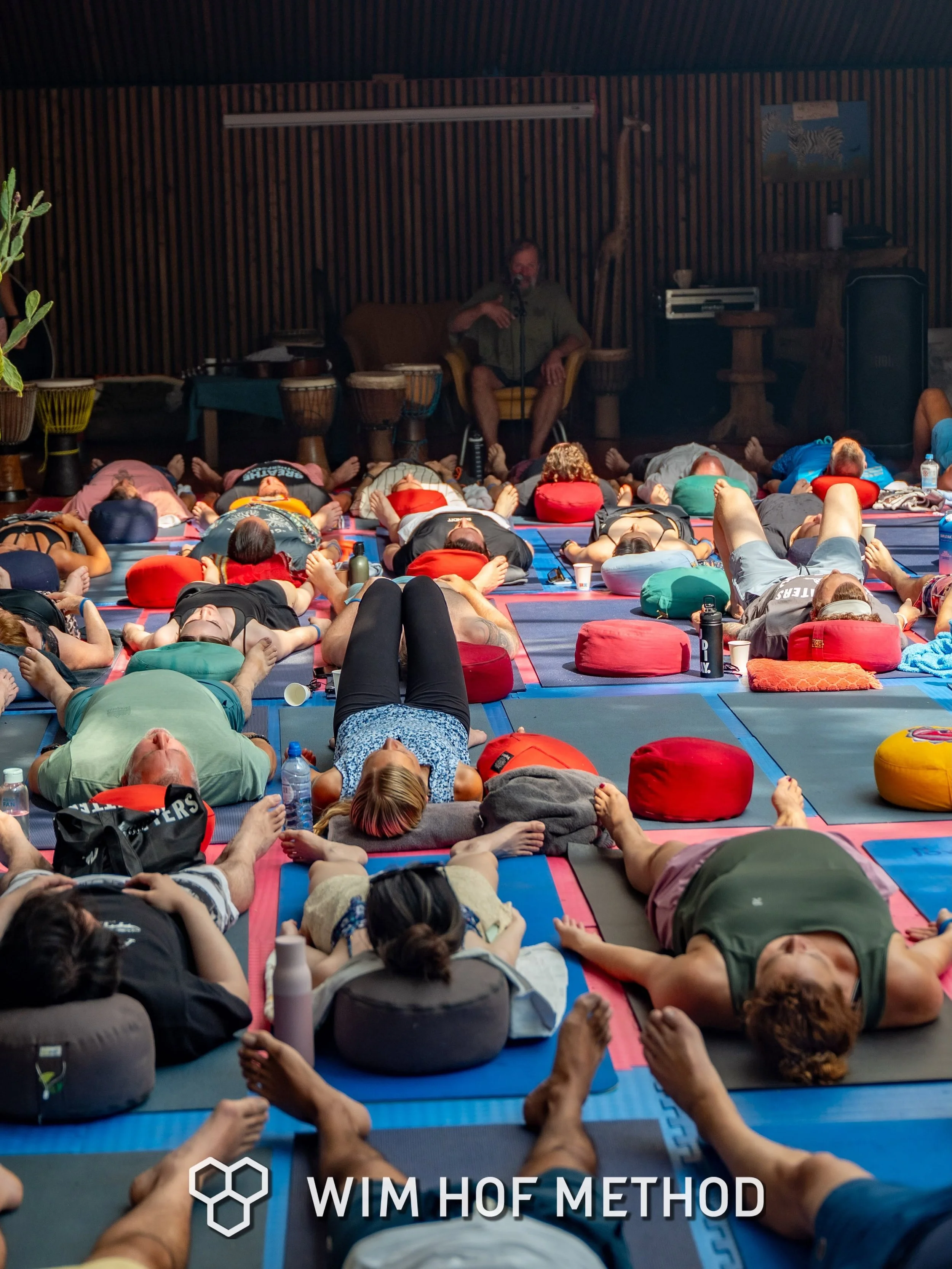Group breathwork session outdoors at a Wim Hof Method immersive weekend
