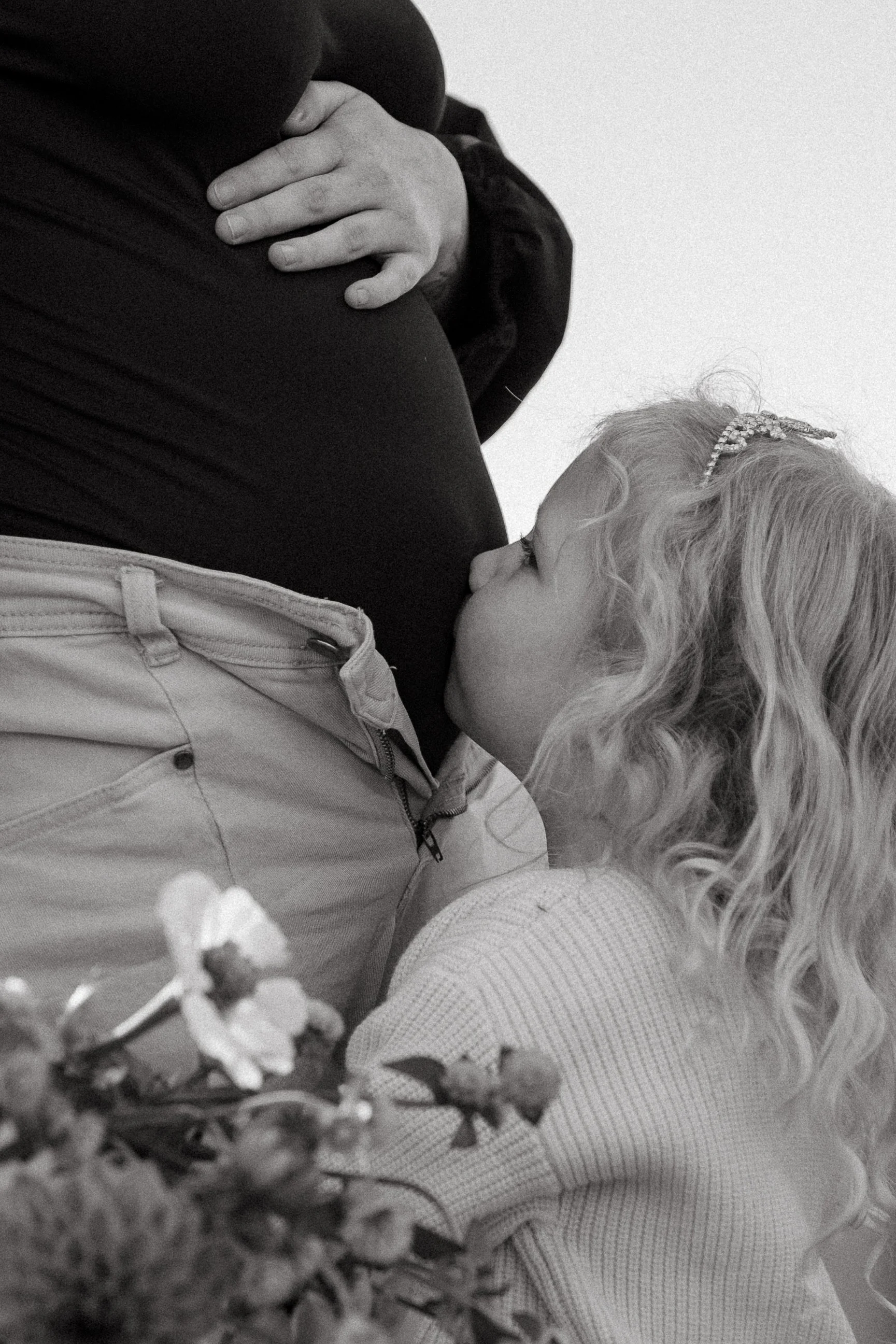 maternity-photoshoot-toddler-kissing-baby-bump.jpg