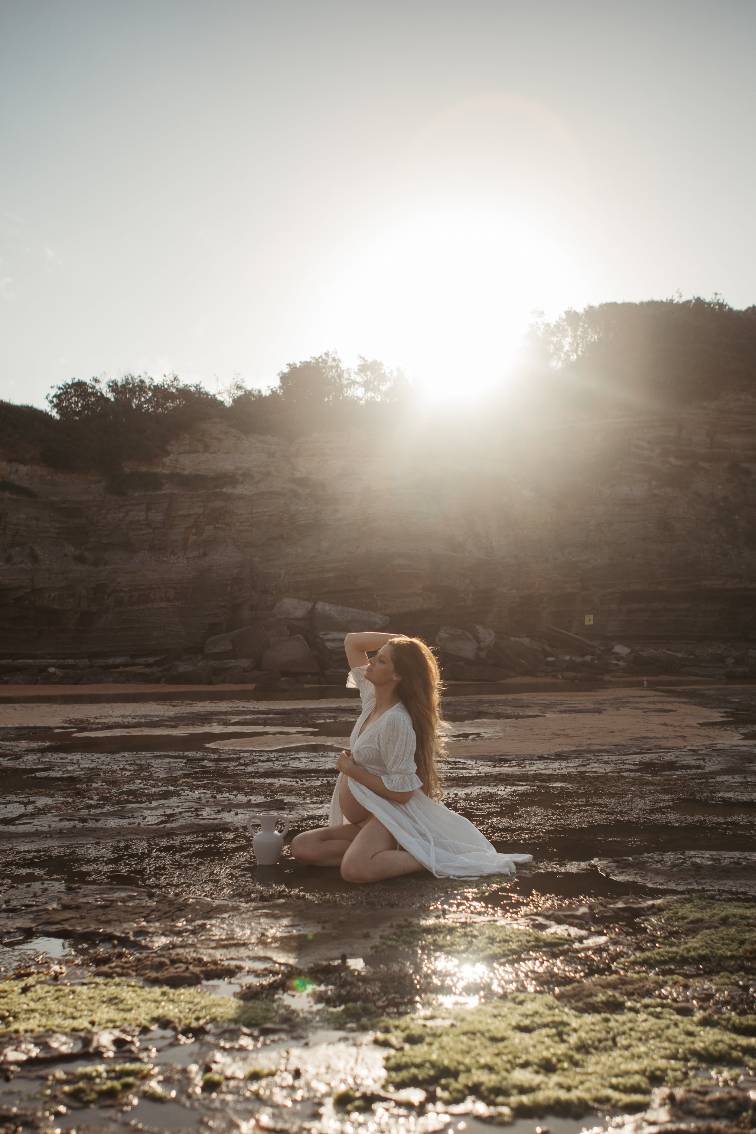 sunset-maternity-photoshoot-expecting-mother.jpg