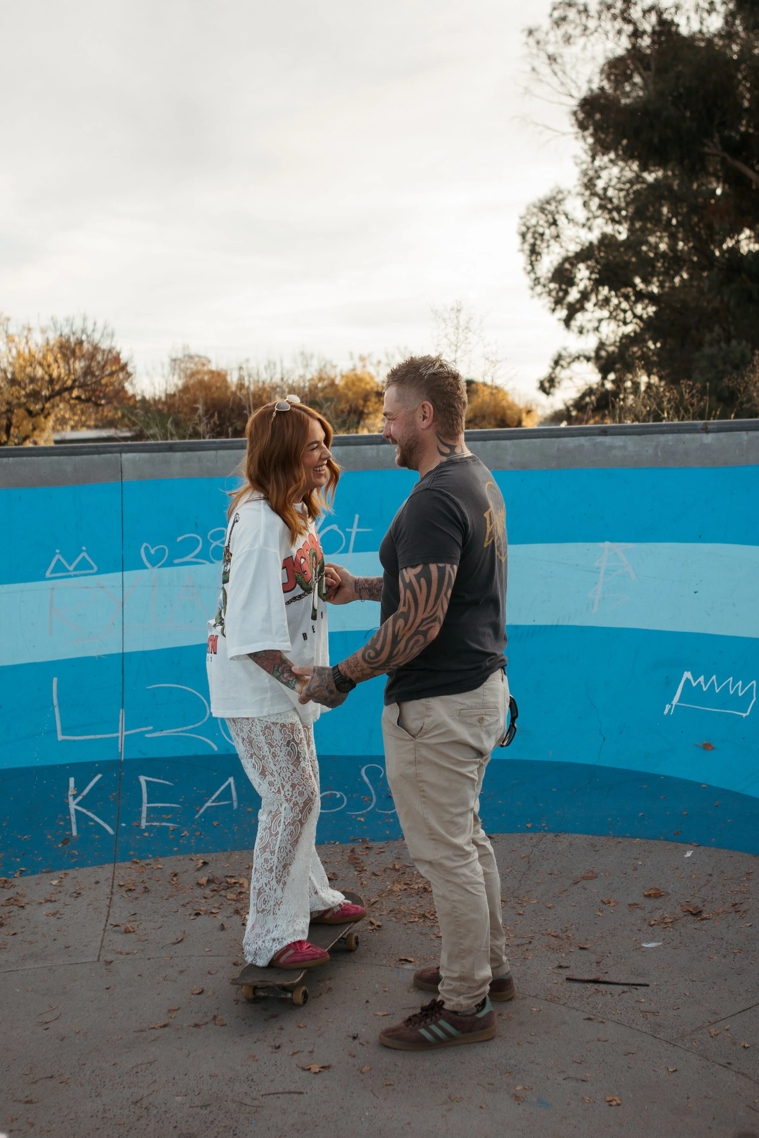 couple-photoshoot-skate-park-husband-and-wife-playful.jpg