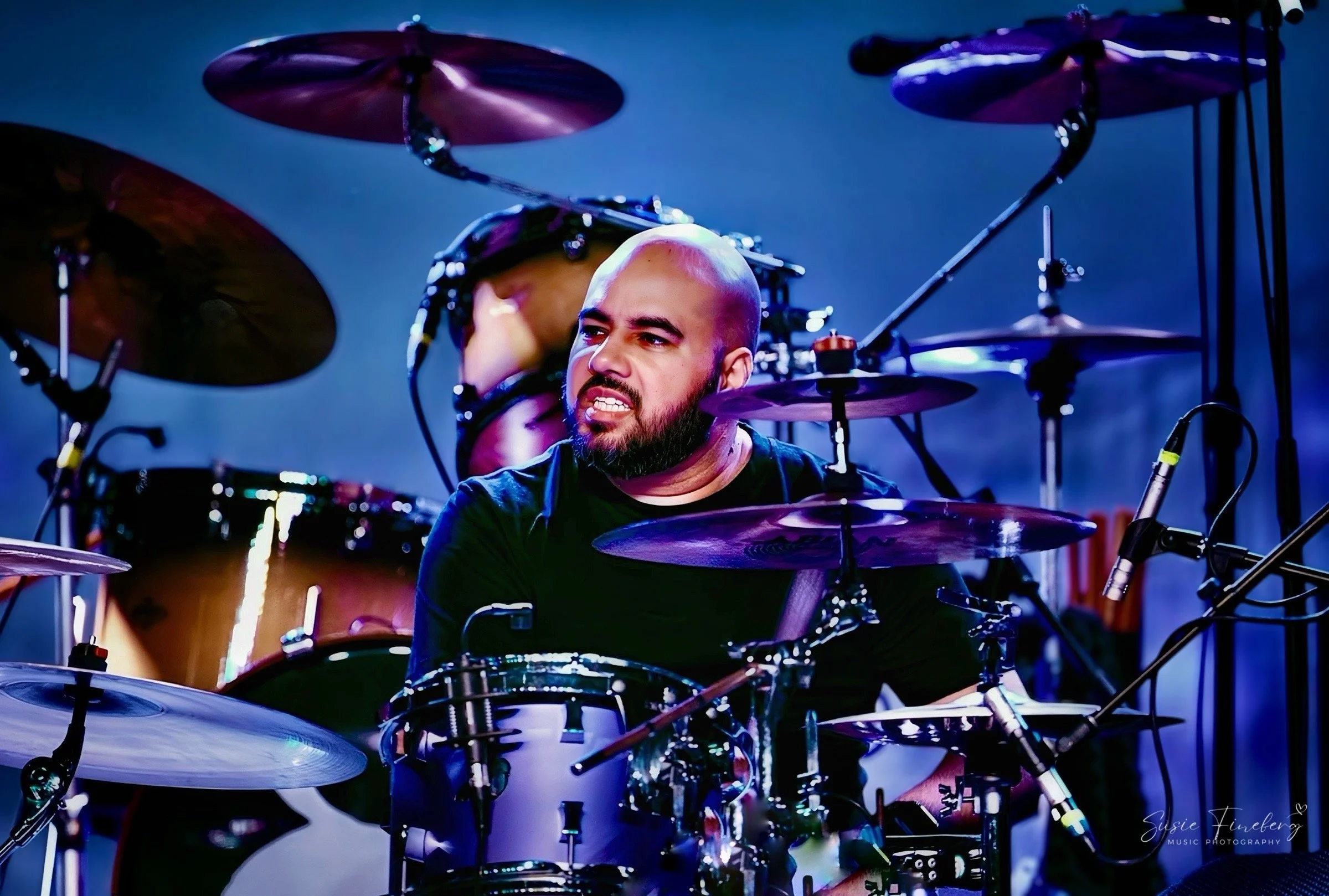 Andres Beuses (Fergal Lawler) playing the drums live on stage. Drummer for the cranberries tribute band