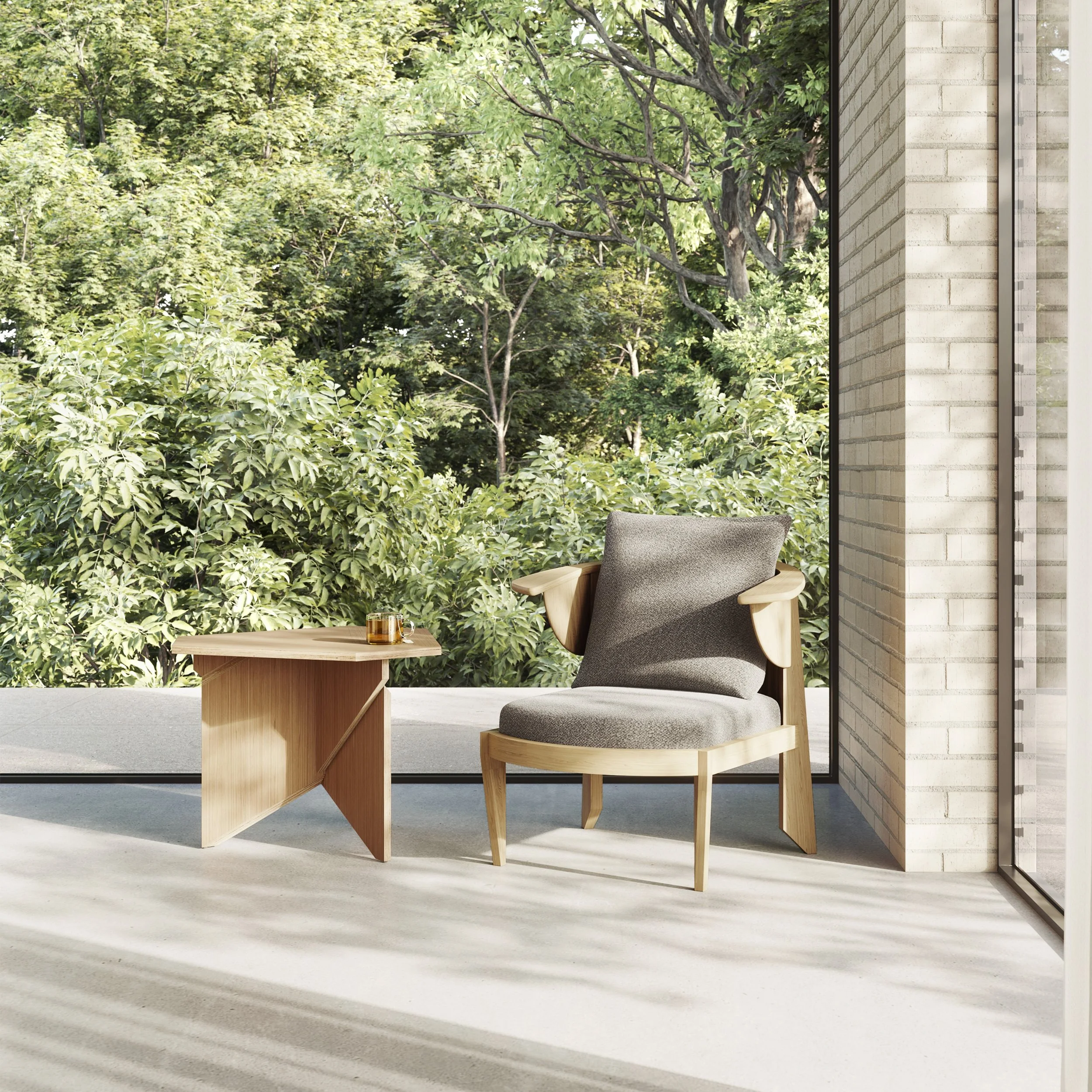 Modern chair from the Frank Lloyd Wright Collection with wooden frame and gray cushion next to a small wooden table.