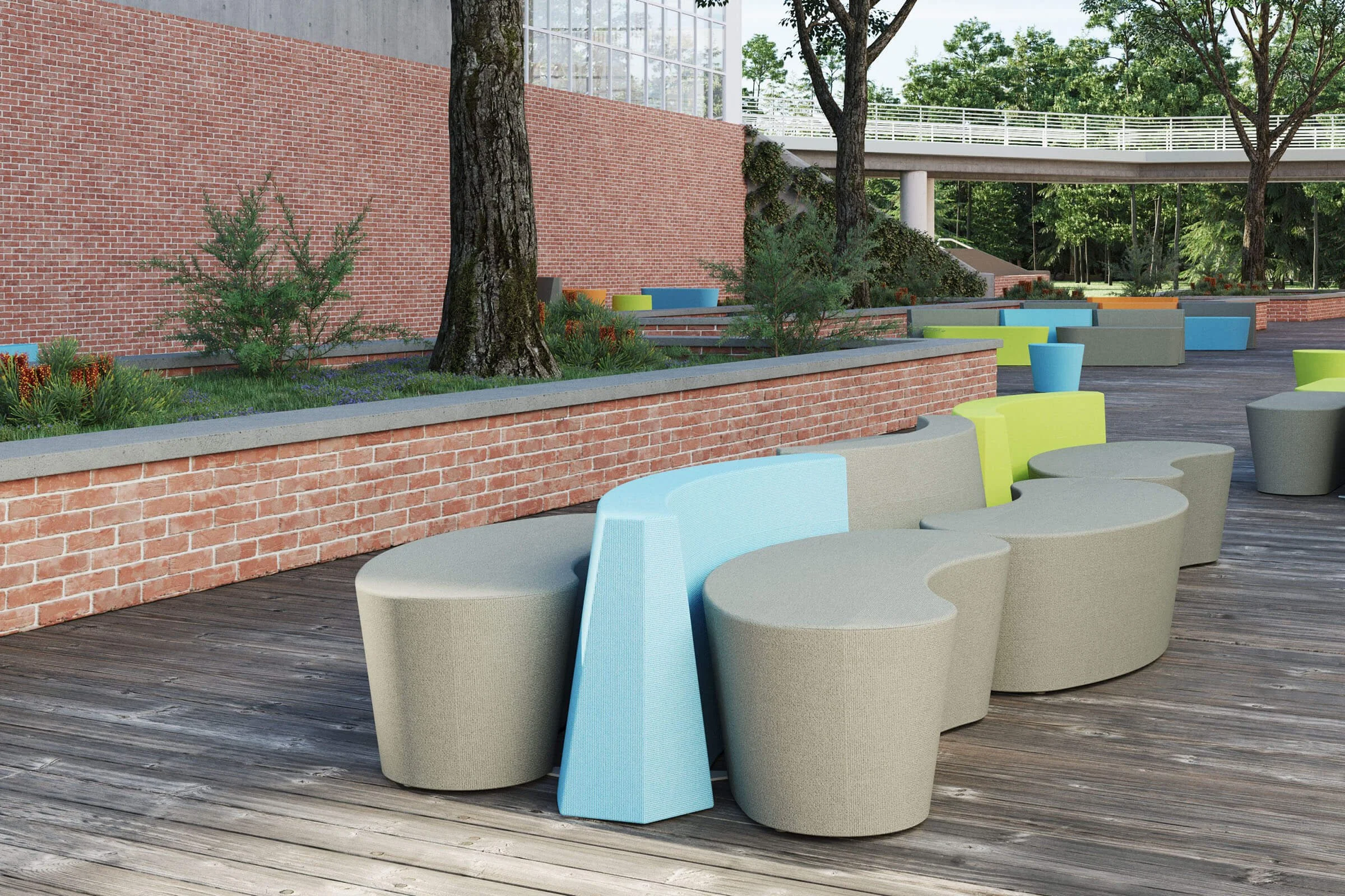 Colorful outdoor seating area at a school featuring round cushioned benches from Smith System.