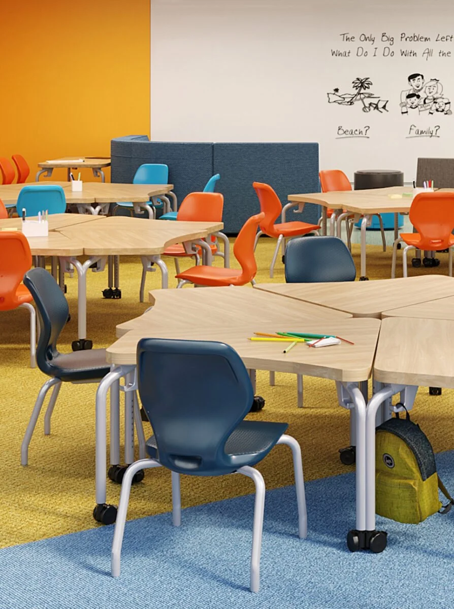 Classroom featuring furniture from Smith System, with colorful tables and chairs, markers on a table, and a whiteboard.