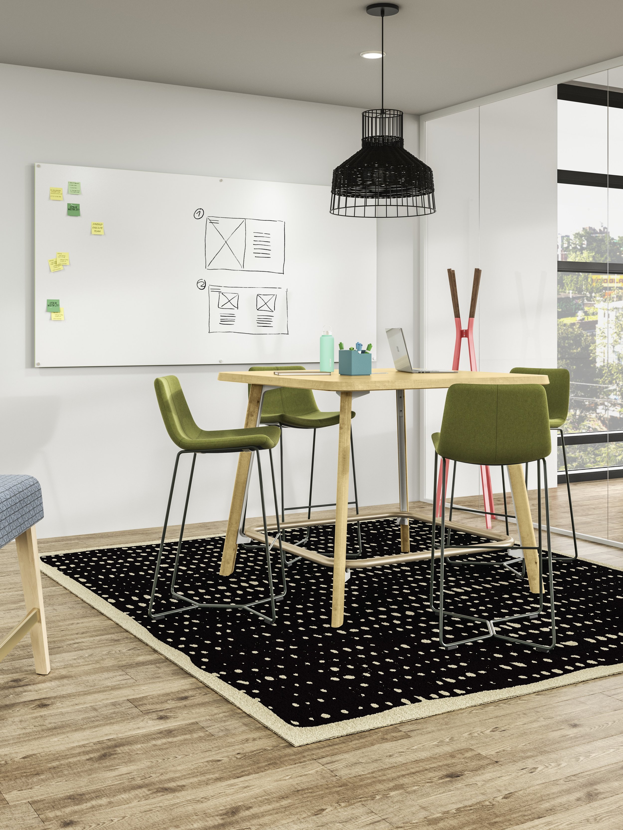 Modern office conference room featuring a round wooden table, four green chairs, and a PolyVision CeramicSteel whiteboard.