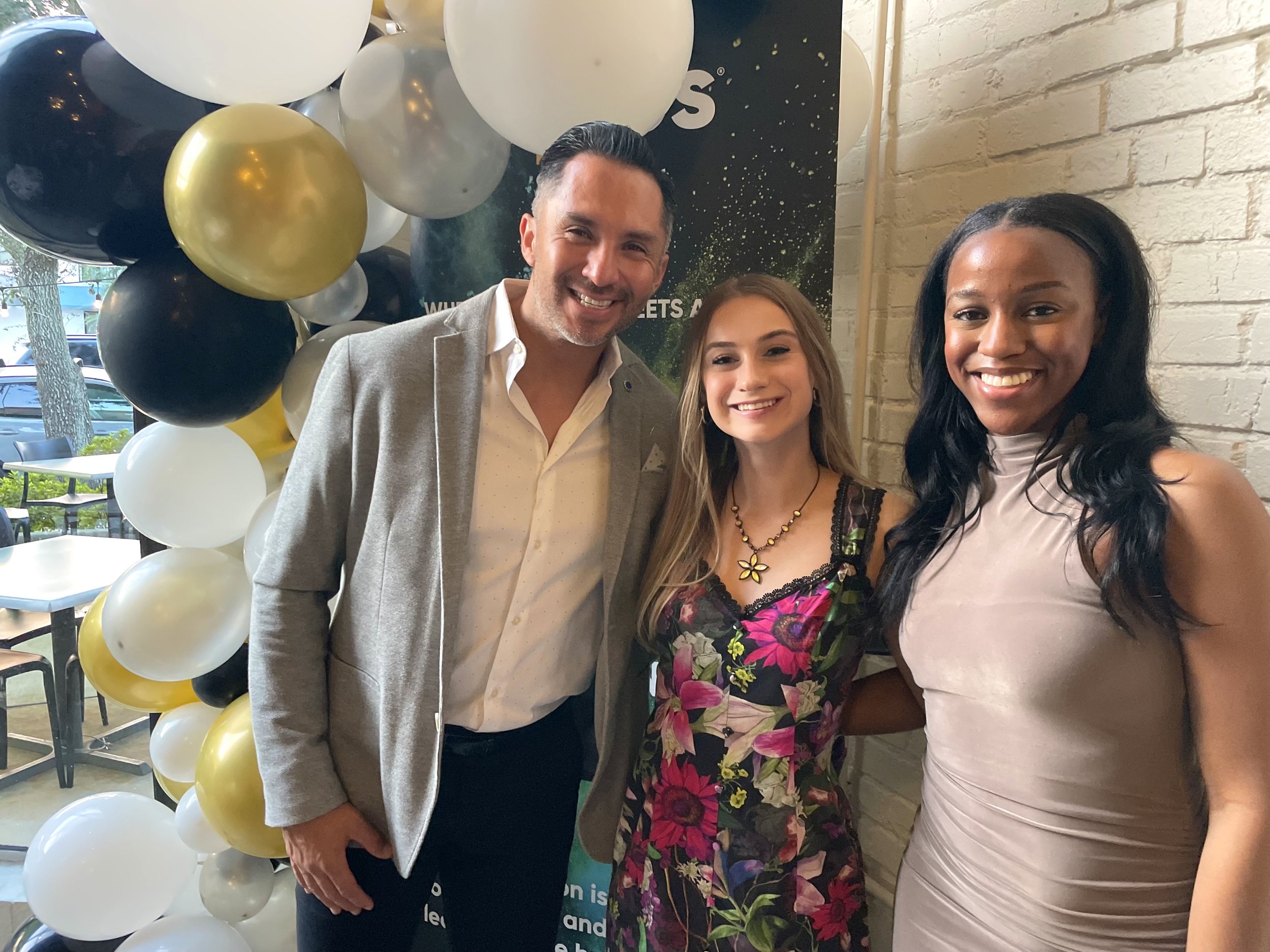 Francisco Morales and Maci Spahr posing for a photo at the 2024 Society for Marketing Professional Services (SMPS) Southeast Louisiana SeLabration Awards event.