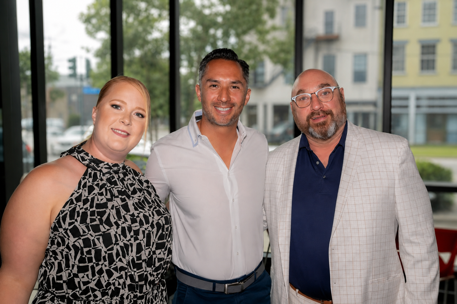 Katy Lovell, Francisco Morales, and Paul Maczka from Workplace Solutions at an IIDA event.