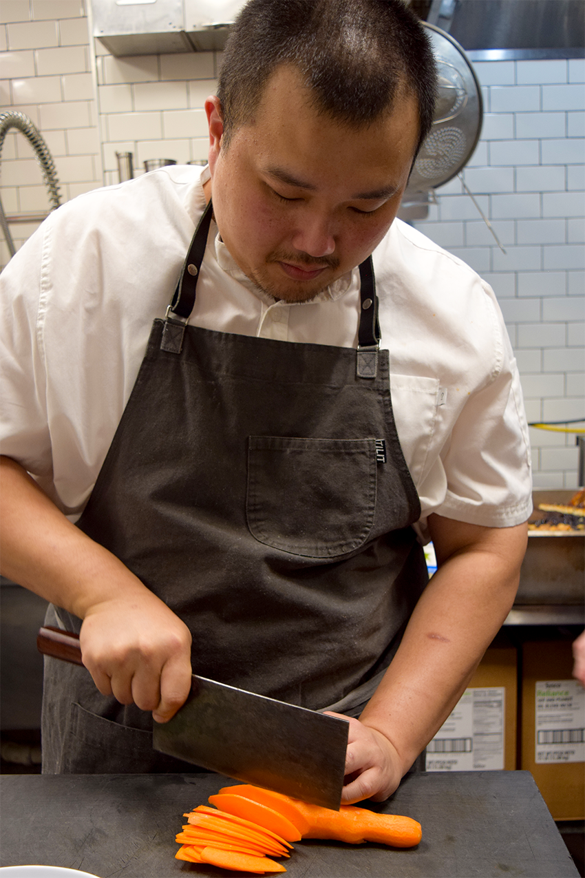 Chef Ray cutting vegetables