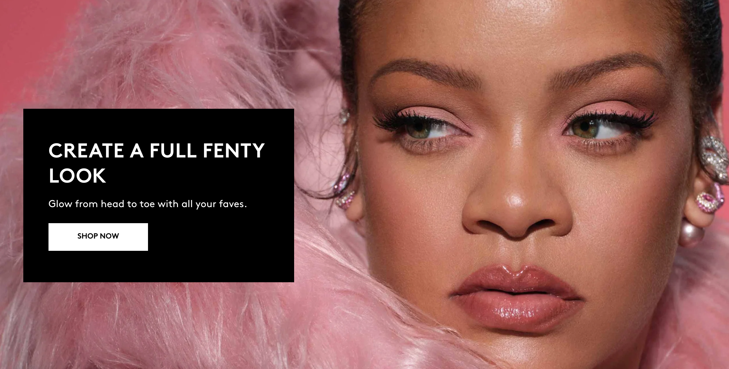 Close-up of a woman with makeup, earrings, and styled hair, surrounded by pink feathers.