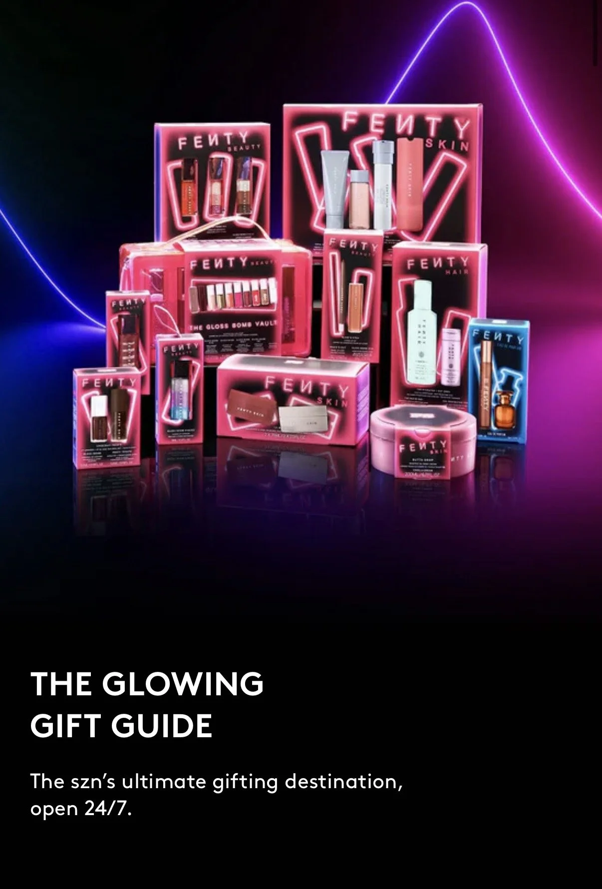 A display of various Fenty Beauty skincare and makeup products arranged on a reflective surface with pink and purple neon lights in the background, promoting a gift guide for Fenty Beauty.