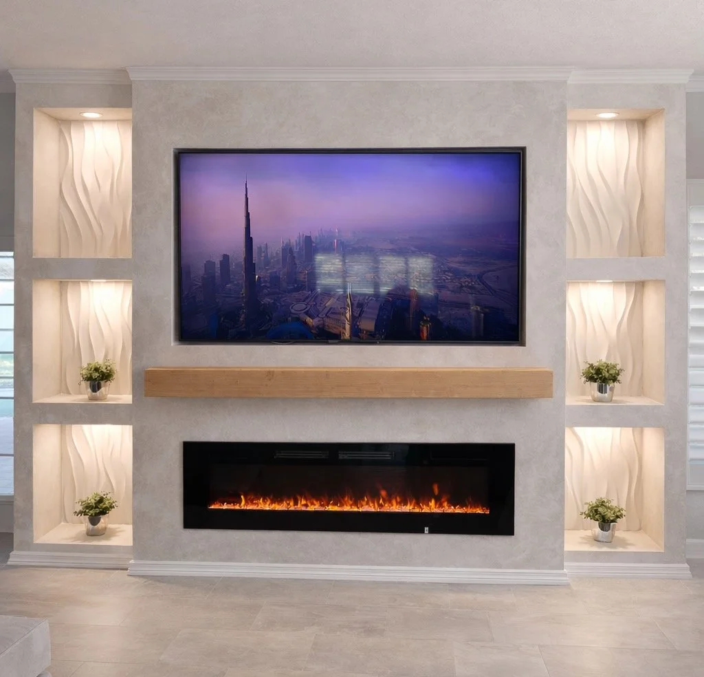 Living room with a flat-screen TV displaying a cityscape, surrounded by wall niches with decorative panels and potted plants, and a modern electric fireplace below the TV.