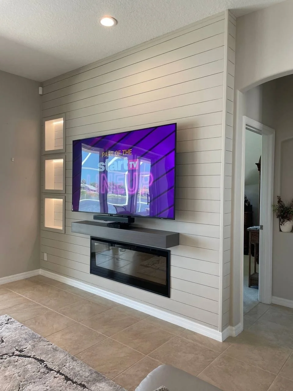 Shiplap Fireplace Media Wall with LED Niches in Bradenton, Florida