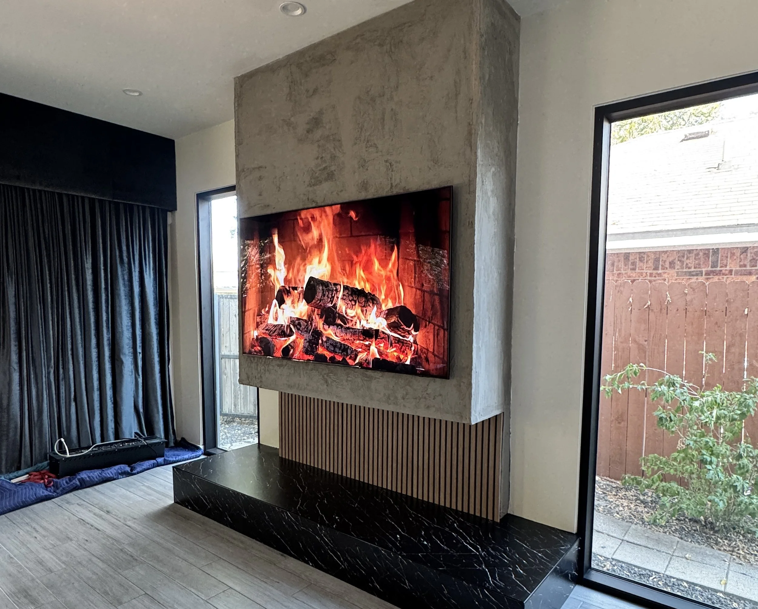 Custom Floating Concrete and Wood Slat TV Wall in Dallas, Texas