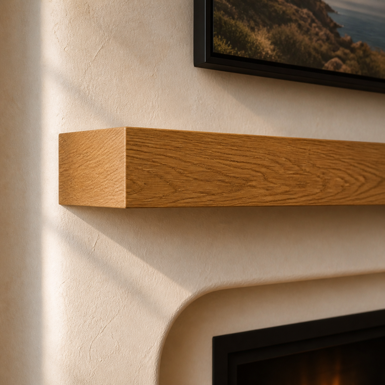 Natural oak floating mantel installed on a warm textured plaster Mediterranean fireplace wall