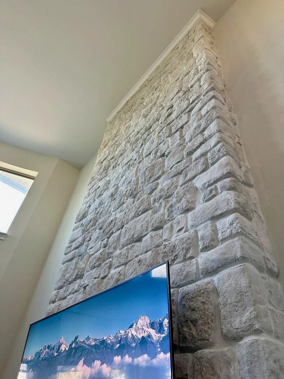 Stone Fireplace Media Wall Installation in Orlando