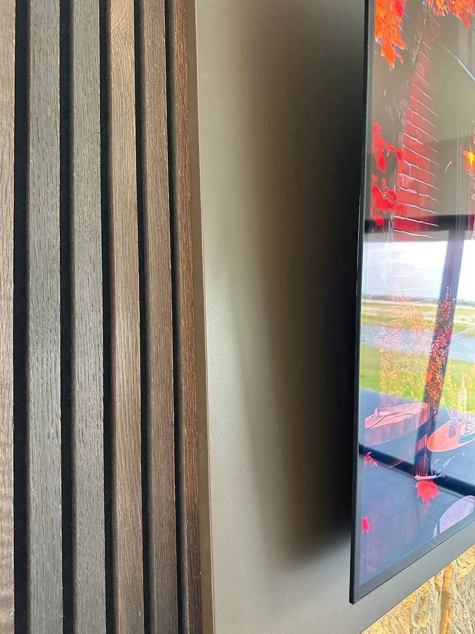 Wood slat accent wall and floating panel detail