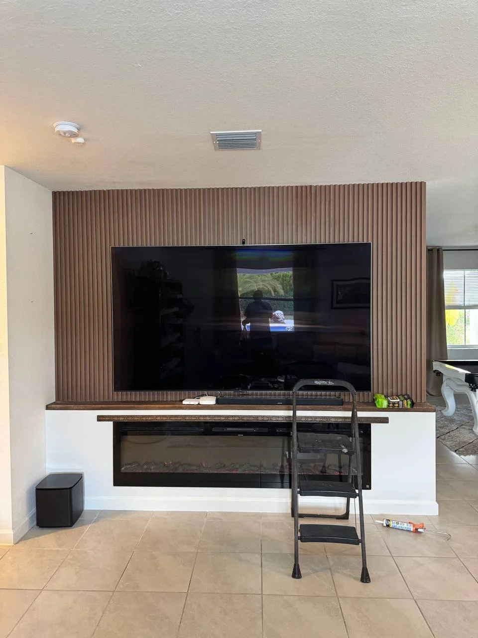 wood slat tv feature wall with fireplace miami florida