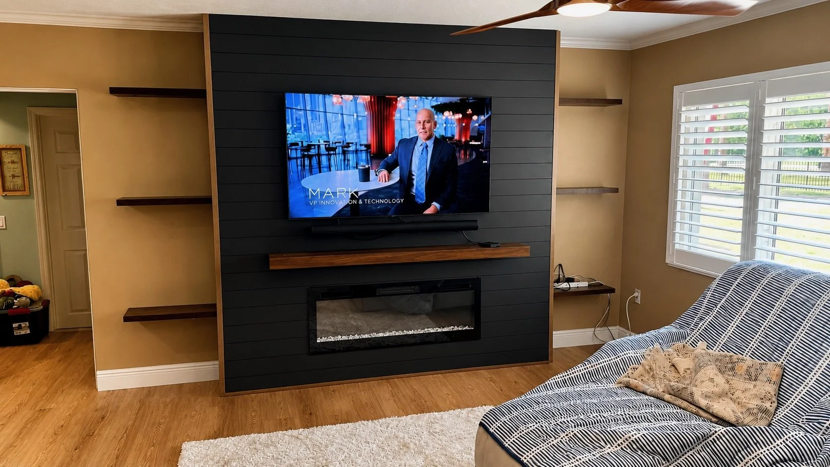 Modern Black Fireplace Media Wall with Floating Shelves – Sarasota, FL