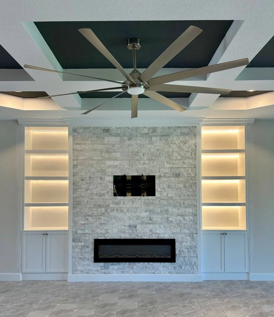 Coffered ceiling and built-in entertainment wall design
