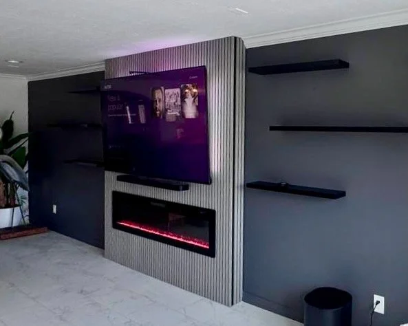 slat fireplace media wall with side floating shelves modern design