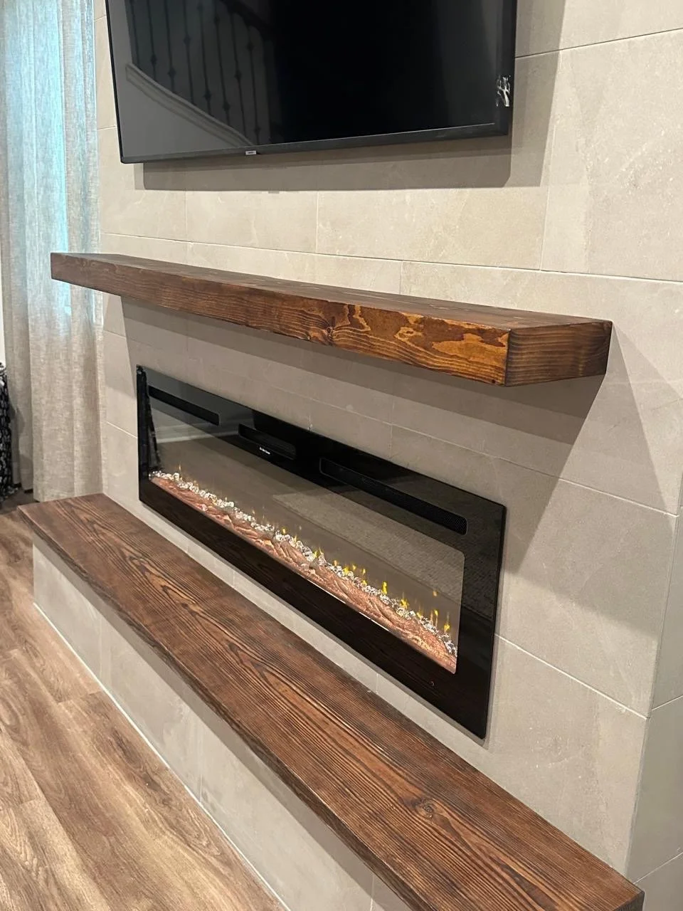 linear electric fireplace with flame effect in media wall