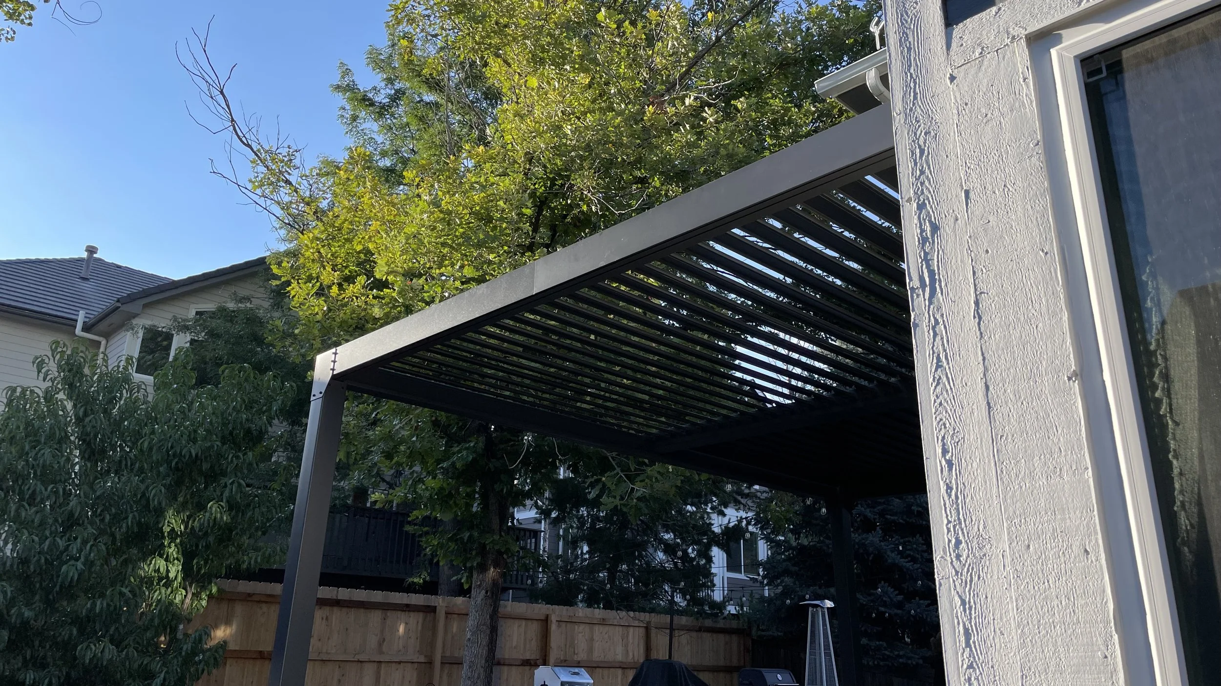Modern Attached Metal Pergola with Adjustable Louvers — Charlotte, NC