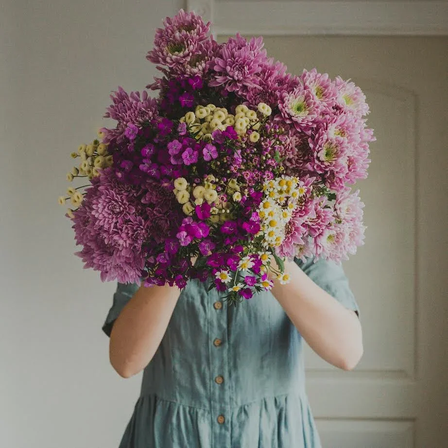 girl holding flowers