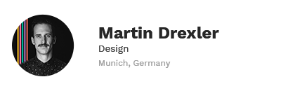 Profile picture of Martin Drexler, a man with a mustache and dark hair, wearing a black shirt with a dotted pattern, against a black background with colorful stripes.