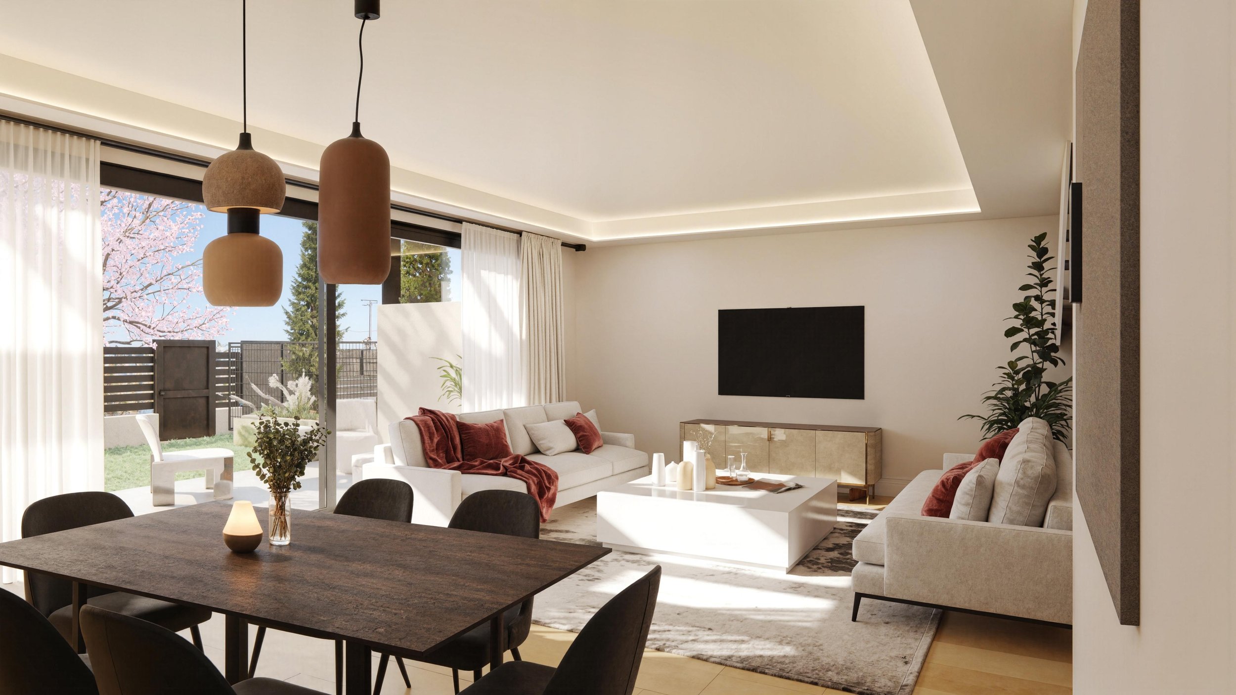 Modern living room with white sofas, a wooden dining table with black chairs, ceiling pendant lights, and a large window showing an outdoor garden with cherry blossom tree