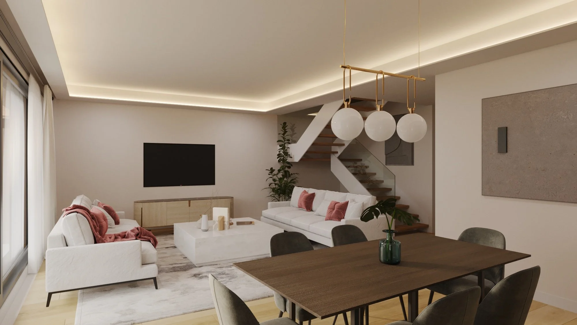 Modern living room with white sofas, pink pillows, a wooden dining table with chairs, a chandelier with white globes, a staircase, a TV on a low cabinet, and decorative items on a white coffee table.