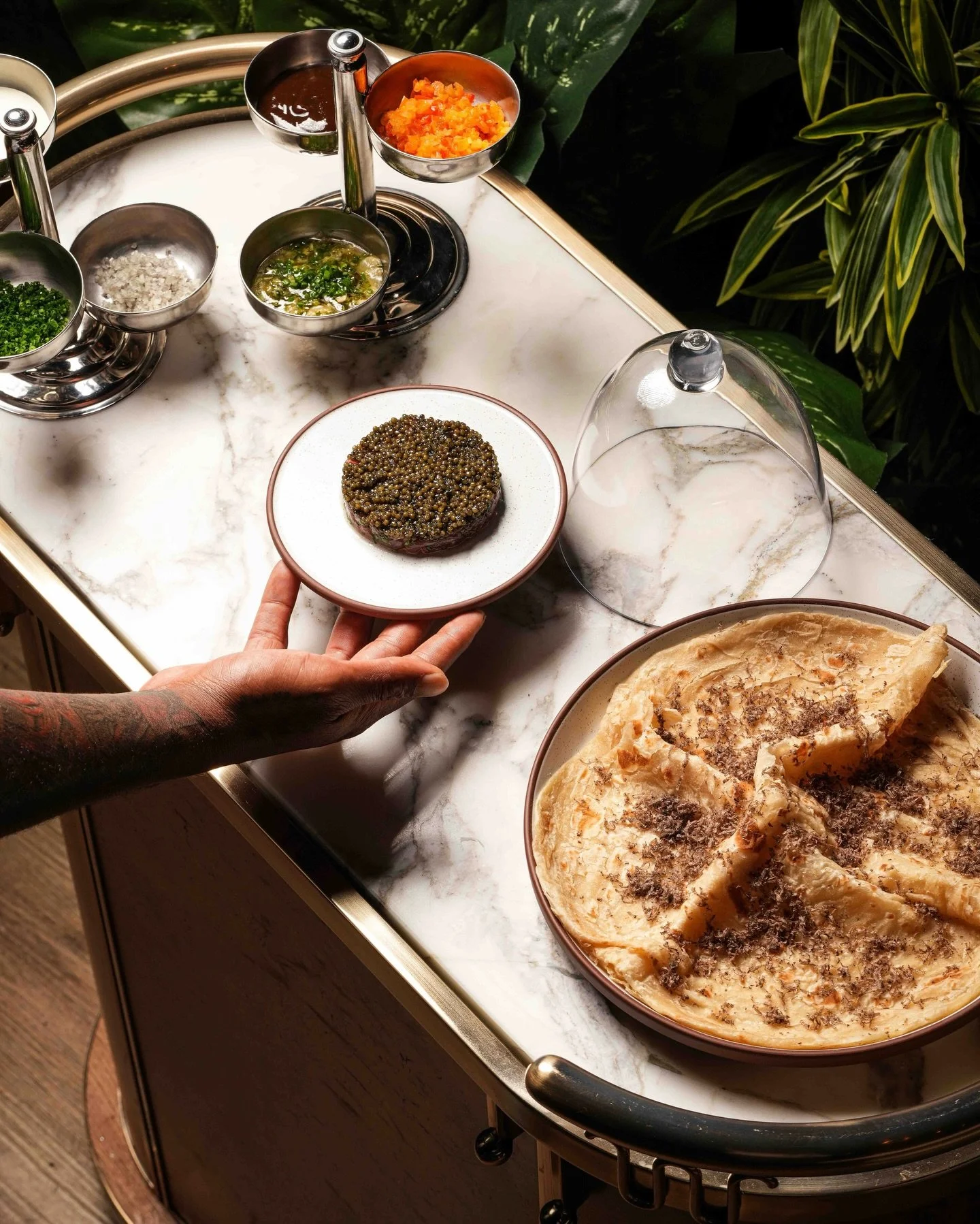 This is what happens when we order caviar service. With a small piece of roti, we scoop some tuna tartare with a generous amount of caviar, and before we know it, the entire table goes quiet in that &ldquo;this is insane&rdquo; moment. #LasLapMiami