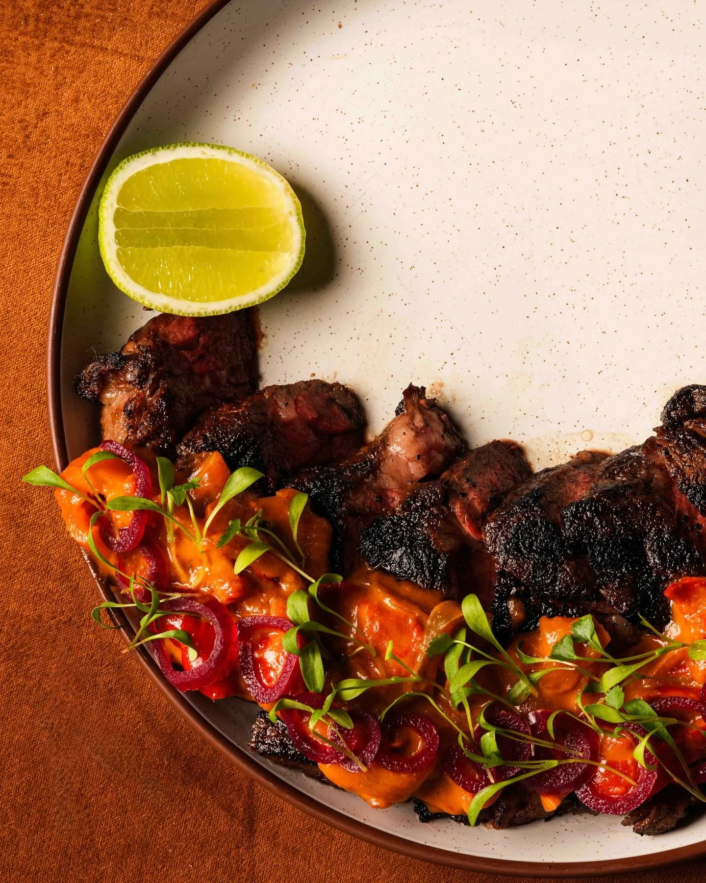 When the Pepper Steak shows up, forks start moving, conversation slows down, and suddenly everyone&rsquo;s negotiating the last bite. It&rsquo;s always gone faster than expected. #LasLapMiami