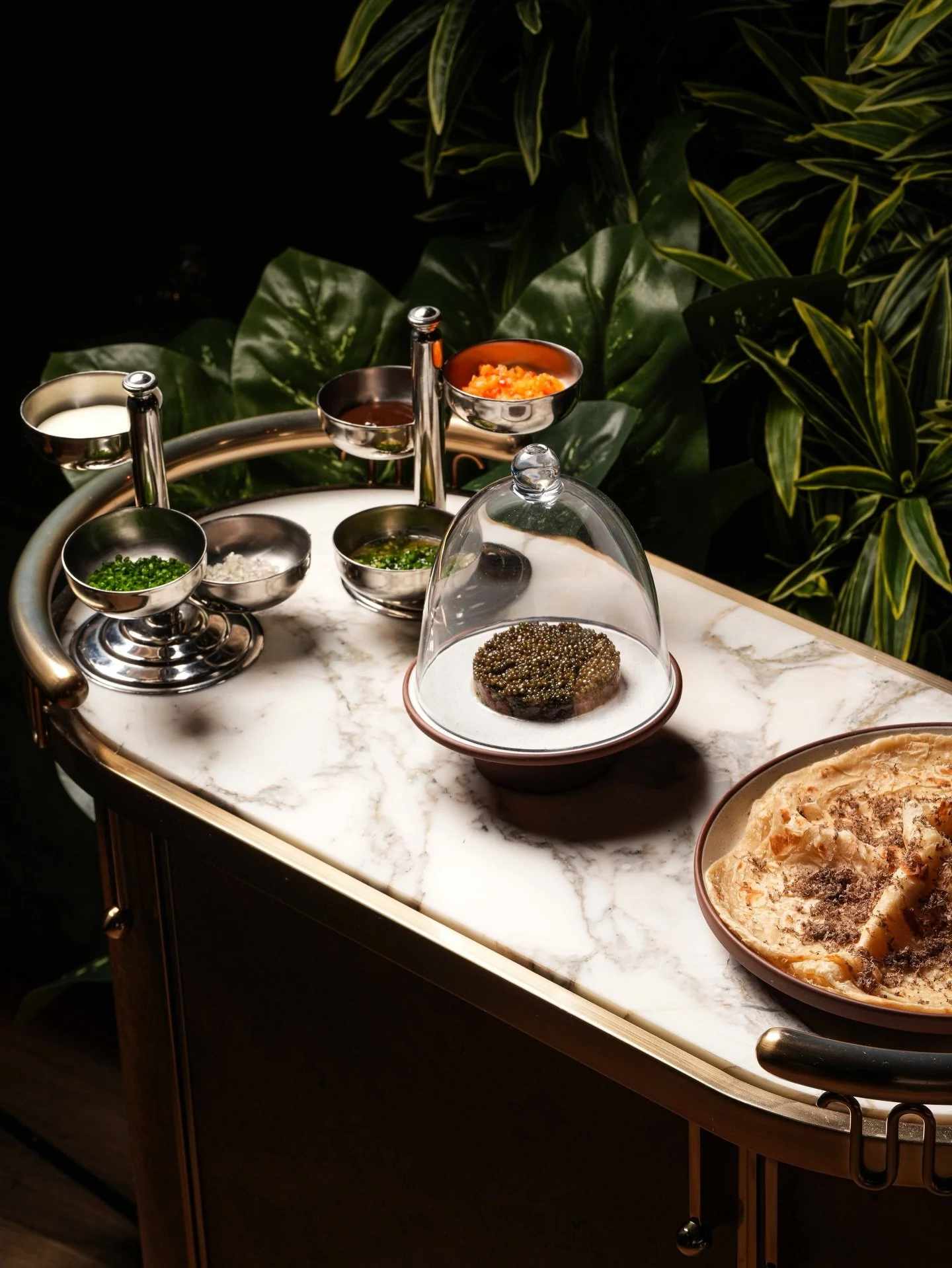 Some moments can&rsquo;t be described, only experienced. ✨ Roti fresh out of the oven, big eye tuna tartare in the middle, caviar added without asking. Passed around, shared, enjoyed together. That&rsquo;s why we love starting dinner with our Caviar 