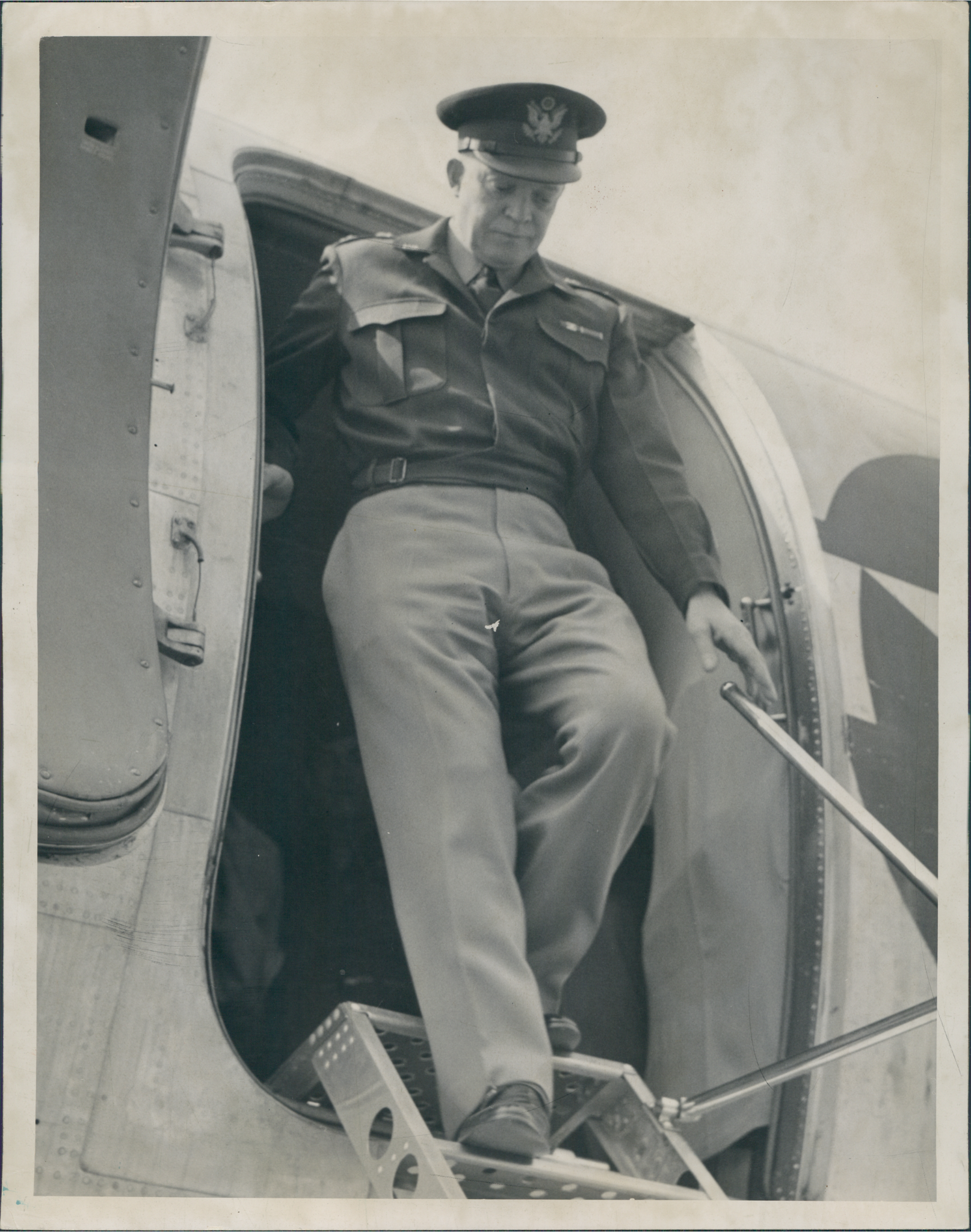 Dwight D. Eisenhower exiting plane
