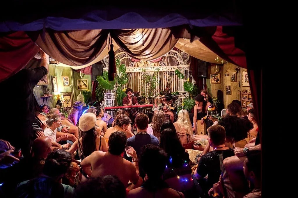 Audience gathered around a live performance inside CAMP's participatory festival environment.