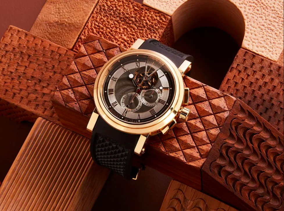 Breguet Marine 5837 Tourbillon with a background of blocks of wood