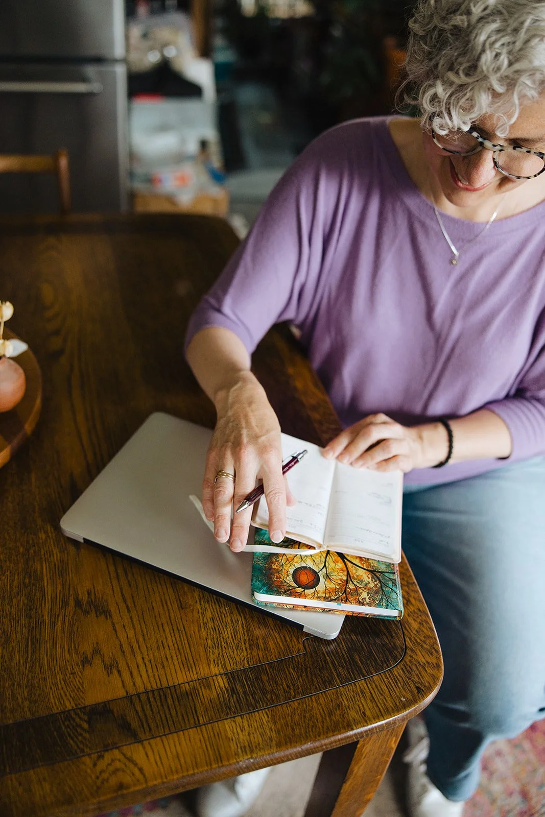 hands holding open a calendar