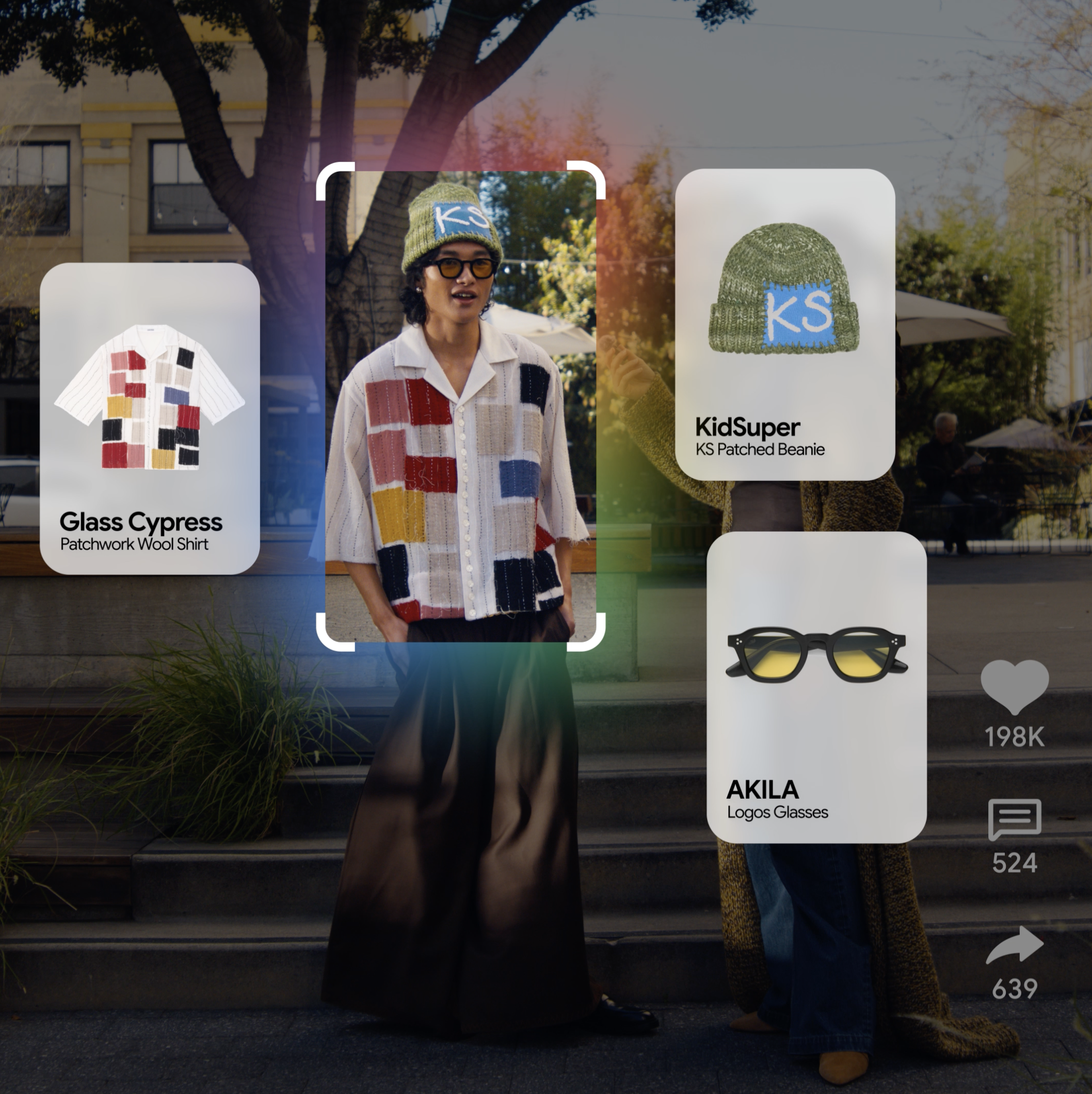 People shopping outdoors, focusing on items including a patchwork wool shirt and a green knitted beanie with blue patches embroidered with 'KS', possible sunglasses, and boots, with trees and a building in the background.
