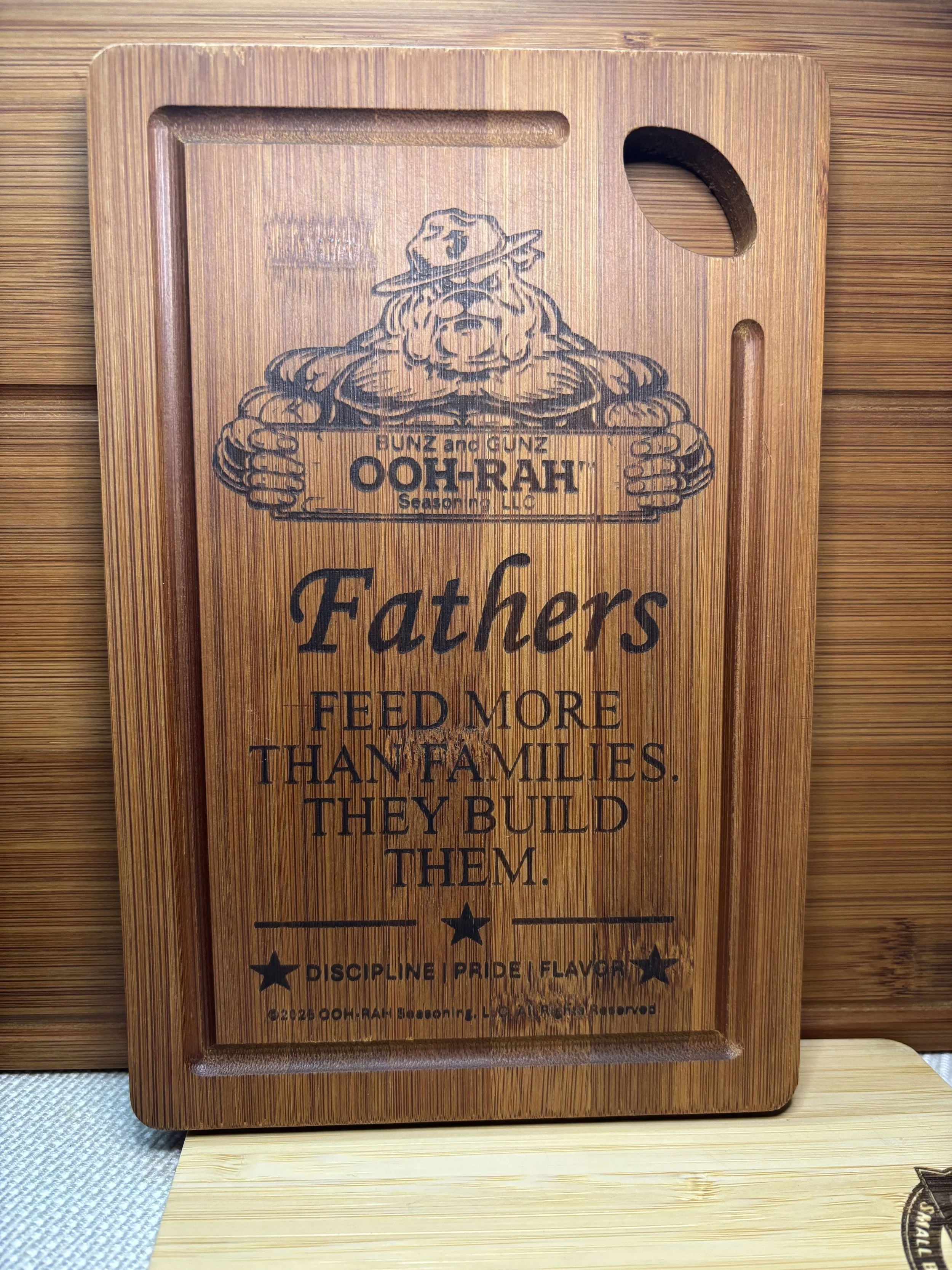 OOH-RAH™ Fathers Feed More Than Families Engraved Bamboo Cutting Board
