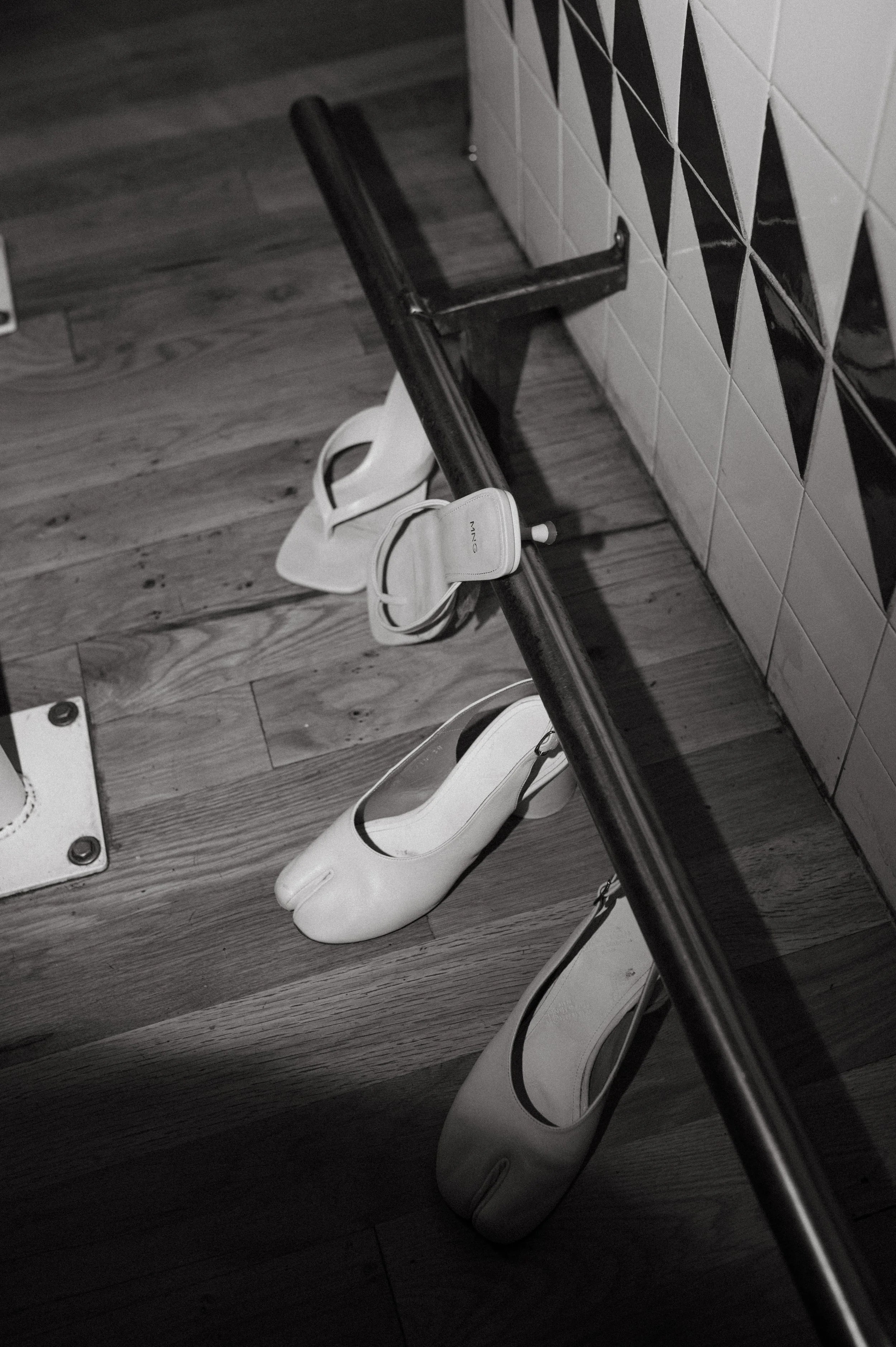tabis laying on the floor as the bride took them off to dance at her wedding reception. 
